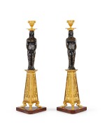 A pair of Directoire patinated and gilt-bronze candlesticks, circa 1800 | Paire de bougeoirs en bronze doré et patiné d'époque Directoire, vers 1800