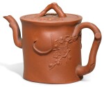 A 'YIXING' 'PRUNUS' TEAPOT AND COVER