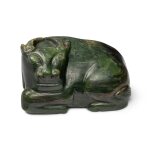 A large spinach-green jade carving of a recumbent water buffalo, 20th century | 二十世紀 碧玉雕臥牛擺件