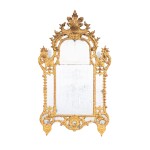 A giltwood mirror, French Regence, circa 1720 | Miroir à parecloses en bois doré d'époque Régence, vers 1720