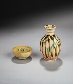 A sancai-glazed vase and a small green-splashed bowl, Tang dynasty | 唐 三彩花瓶及綠斑小盌一組兩件