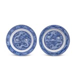 A pair of blue and white 'dragon' dishes, Qing dynasty, Kangxi period | 清康熙 青花雙龍趕珠紋盤一對