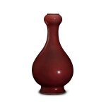A copper-red-glazed garlic-mouth vase, Seal mark and period of Qianlong | 清乾隆 紅釉蒜頭瓶 《大清乾隆年製》款