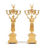 A pair of Empire style gilt-bronze candelabra