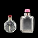An octagonal glass snuff bottle and a hair-crystal snuff bottle, Qing dynasty, 18th - 19th century | 清十八至十九世紀 透明料八方鼻煙壺 及 髮晶鼻煙壺一組兩件