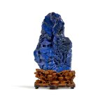 A carved lapis lazuli boulder, Qing dynasty, Qianlong period | 清乾隆 青金石雕松蔭樓閣圖山子