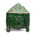 A green-glazed pottery tripod incense burner and a cover, Han dynasty | 漢 綠釉三足蓋爐配蓋