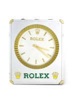 ROLEX | A STAINLESS STEEL AND BRASS BUILDING SIGN CLOCK, CIRCA 1970