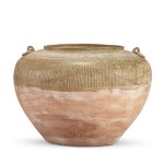 A celadon-glazed handled jar, Eastern Zhou dynasty, Warring States period 東周 戰國 青釉雙繫罐