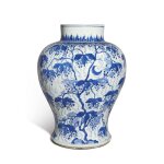 A copper-red and underglaze blue 'squirrel and grape' baluster jar, Qing dynasty, Kangxi period | 清康熙 青花釉裏紅松鼠葡萄圖罐