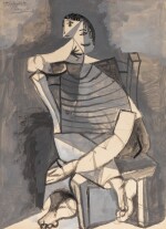 Homme au tricot rayé assis