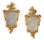 A pair of North Italian painted and carved giltwood mirrors, circa 1760