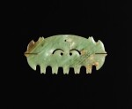 An open work celadon jade 'toothed animal mask' ornament, Neolithic period, Hongshan culture, circa 3500 BC | 新石器時代 紅山文化 約公元前3500年 青玉帶齒動物面紋飾