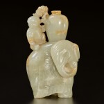 A pale green and russet jade 'elephant and boy' group, Qing dynasty, 17th / 18th century | 清十七 / 十八世紀 青玉雕太平有象擺件