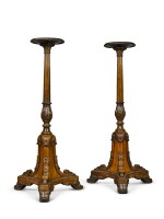 A pair of George IV carved mahogany torchères,  second quarter 19th century, in the manner of Gillows