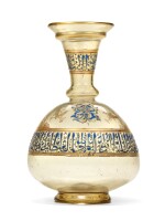 A HIGHLY IMPORTANT MAMLUK GILDED AND ENAMELLED GLASS FLASK, SYRIA, MID-13TH CENTURY
