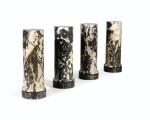 A set of four faux marble painted plaster columns 