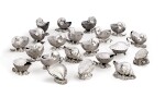 Twenty-one silver-plated shell-form spoon warmers, England, late 19th/early 20th century