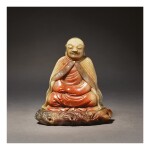 A SUPERB SOAPSTONE FIGURE OF A LUOHAN, ATTRIBUTED TO ZHOU BIN, 17TH / 18TH CENTURY