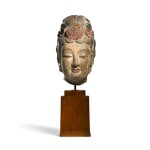 An extremely rare large limestone head of a bodhisattva Sui dynasty | 隋 石灰岩加彩菩薩頭像