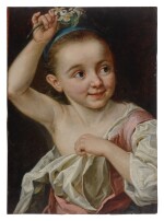 Young girl holding a flower
