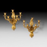 A pair of gilt-bronze five-light wall-lights, Louis XV style, late 19th century | Paire d'appliques à cinq lumières en bronze doré de style Louis XV, fin XIXe siècle