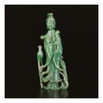 AN APPLE-GREEN JADEITE FIGURE OF A STANDING MEIREN, LATE QING DYNASTY