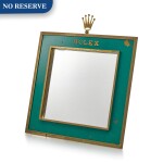 ROLEX | A GILT BRASS AND GREEN ENAMEL RETAILER'S DISPLAY MIRROR WITH WOODEN BACK, CIRCA 1960