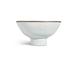 An exceptionally rare white-glazed 'Eight Buddhist Emblems' stem bowl, Mark and period of Xuande | 明宣德 白釉暗花纏枝蓮托八吉祥紋高足盌 《大明宣德年製》款