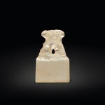 A small glass 'mythical beast' seal, Han dynasty | 漢 琉璃瑞獸鈕印料