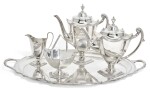 A MATCHED SILVER FOUR-PIECE TEA SERVICE AND TRAY, THE TEA SERVICE, WAKER & HALL, SHEFFIELD, 1911