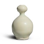 A rare white-glazed double-gourd vase, Tang dynasty | 唐 白釉葫蘆瓶