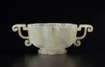 A pale celadon jade lobed cup, Ming dynasty | 明 青白玉菱花式雙耳盃