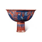 An iron-red-ground underglaze-blue 'scholar' stembowl, Ming dynasty, Wanli period | 明萬曆 礬紅地青花文會圖高足盌