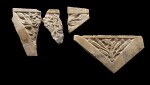 A Group of Four Large South Arabian Triangular Relief Fragments, circa 1st/2nd Century A.D.