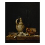 A still life with a stoneware jug, a glass of beer, playing cards and smokers’ requisites