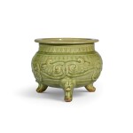 A large moulded Yaozhou celadon incense burner Jin dynasty | 金 耀州青釉纏枝花三足香爐    