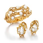 Arthur King | Cultured pearl and diamond bangle, 1970s || Pair of baroque cultured pearl and diamond ear clips, 1970s