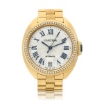 Reference 3853 Clé de Cartier, A yellow gold and diamond-set automatic wristwatch with date and bracelet, Circa 2010