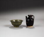 A small Henan black-glazed ewer and a 'Yaozhou' celadon foliate-rim bowl, Tang - Song dynasty | 唐至宋 河南黑釉小執壺及耀州青釉花口盌一組兩件