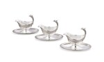 Three silver-plated sauce boats with eagle head handles, probably French, modern