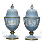 A PAIR OF WEDGWOOD THREE-COLOR JASPERWARE GILT-METAL MOUNTED VASES AND FIXED COVERS LATE 19TH CENTURY 