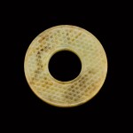 A yellow jade bi disc Song - Ming dynasty | 宋至明 黃玉蒲紋環