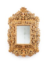 A  rococo Spain or South Italian giltwood mirror frame, 18th century  | Cadre en bois sculpté et redoré formant miroir, Espagne ou Italie du Sud, XVIIIeme siècle