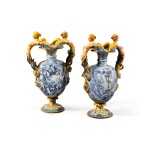 A pair of Italian maiolica large two-handled ovoid istoriato vases, circa 1670, Urbania | Paire de vases ovoïdes à deux anses en majolique "a istoriato", Urbino, vers 1670 