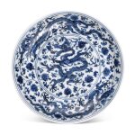 A blue and white 'dragon' dish, Mark and period of Zhengde | 明正德 青花穿蓮龍紋盤 《正德年製》款