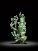 An archaistic spinach-green jade 'phoenix' vase and cover, Qing dynasty, 18th century | 清十八世紀 碧玉仿古鳳紋蓋瓶