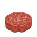 A small carved cinnabar lobed lacquer box and cover, Qing dynasty, Qianlong period