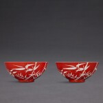 A fine and rare pair of coral-ground reserve-decorated ‘bamboo’ bowls, Seal marks and period of Qianlong | 清乾隆 珊瑚紅地留白竹紋小盌一對 《大清乾隆年製》款