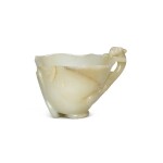A pale celadon jade libation cup, Song - Ming dynasty | 宋至明 青白玉螭龍紋盃